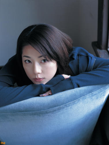 alex on blue chair.jpg